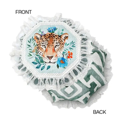 Decorative bolster pillow case with a watercolor leopard face and floral design on one side and green geometric pattern on other side