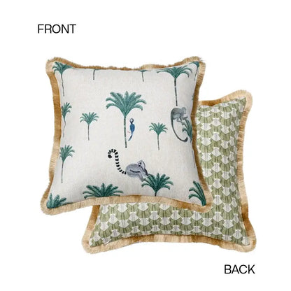 Square bolster pillow case with white front embroidered with green palm trees gray lemurs and tan fringe border