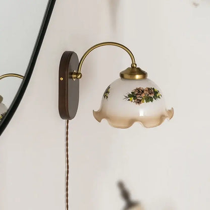 Vintage glass copper led wall lights featuring antique brass finish and frosted floral glass shade with wood backplate