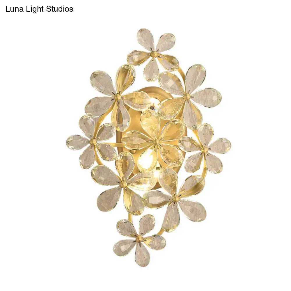 Vintage gold crystal flower wall sconce featuring faceted translucent crystal flowers in a circular cluster for bedroom light