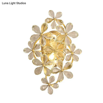 Vintage gold crystal flower wall sconce featuring faceted translucent crystal flowers in a circular cluster for bedroom light