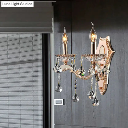 Vintage gold crystal sconce light fixture with two candle bulbs and faceted teardrop pendants direct wired electric