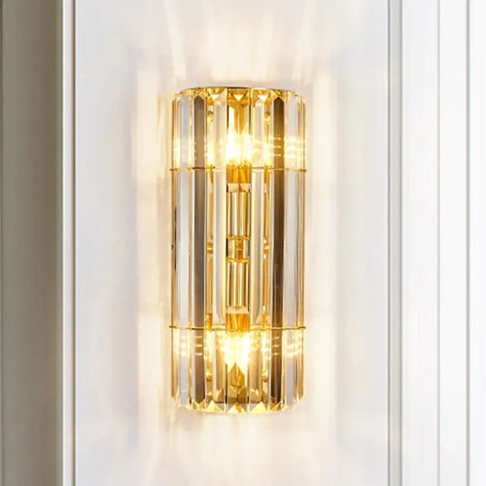 Vintage gold crystal sconce lighting with vertical faceted bars and warm glowing lights wall mounted lamp direct wired electric