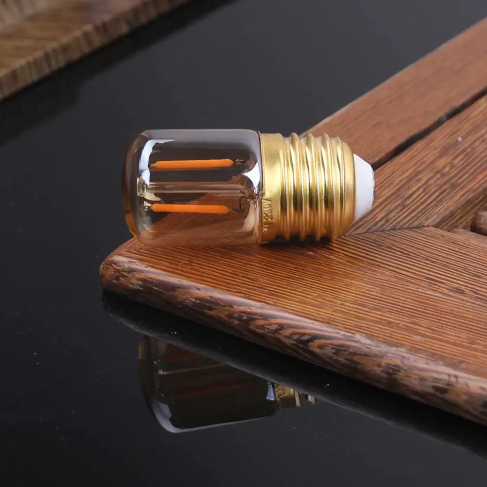 Vintage gold dimmable led tubular bulb with clear glass and orange filaments for bedroom lighting 6 pack