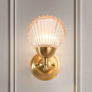 Vintage wall lamp with gold finish metal base and frosted glass seashell-shaped shade for bedroom lighting