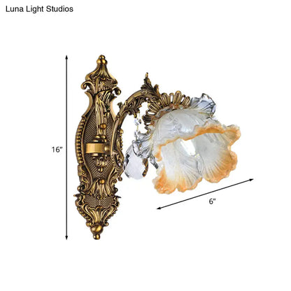 Antique brass wall lamp with a floral design and peach-tinted glass shade for 220v-240v 110v-120v use