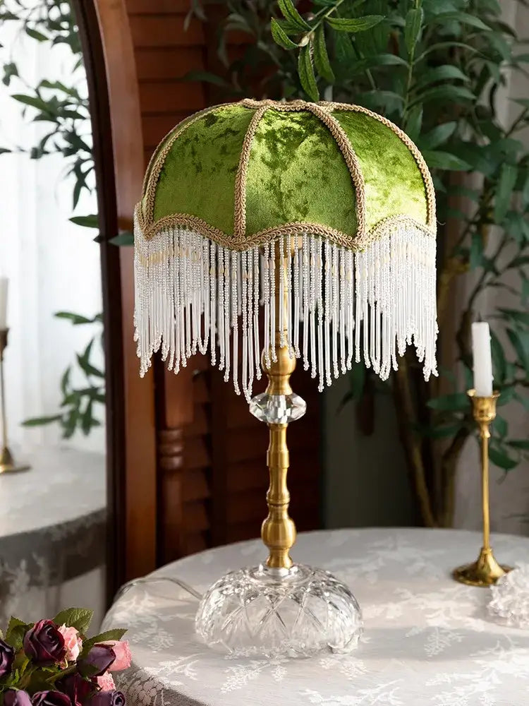 Elegant table lamp with green velvet shade gold lustre tassel fringe and brass stem for decorbites gold lustre decor