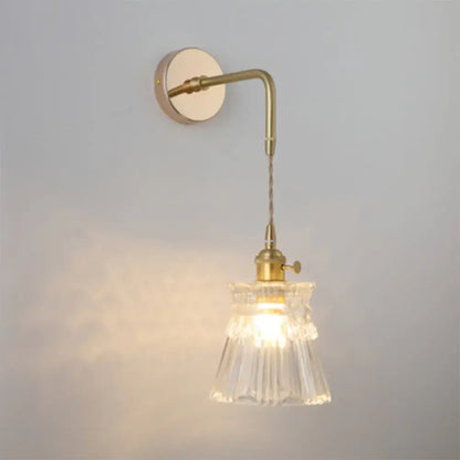 Decorbites vintage brass-finished wall light with clear fluted shaded glass wall light for bedside use