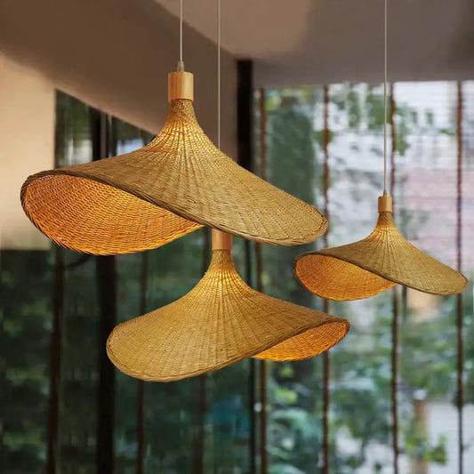Handwoven golden brown bamboo chandeliers led pendant lights with natural textured weave and wooden fixtures for dining room decorbites