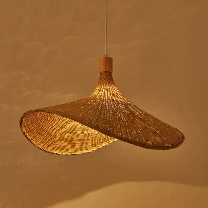 A warm-toned vintage golden brown bamboo chandeliers led pendant light with handwoven rattan and asymmetrical canopy