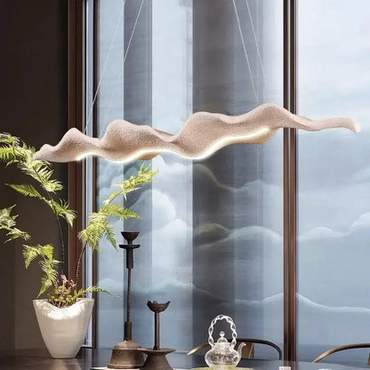 Beige textured wave-shaped pendant light with integrated led lighting and vintage character iron finish for dining room