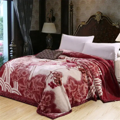 A plush burgundy and cream floral double layered raschel blanket vintage with soft textured surface for bedroom use