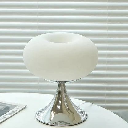 A sleek modern table lamp with cream glass dome and chrome base ideal for bedroom decor by Decorbites cream glass