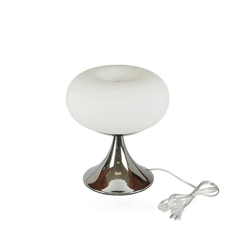 A sleek modern table lamp with cream glass dome and polished chrome base for bedroom decorbites cream glass style