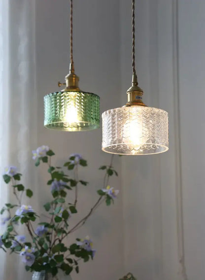 Two vintage glass shade chandelier pendant lights with emerald green and clear textured glass for dining room use