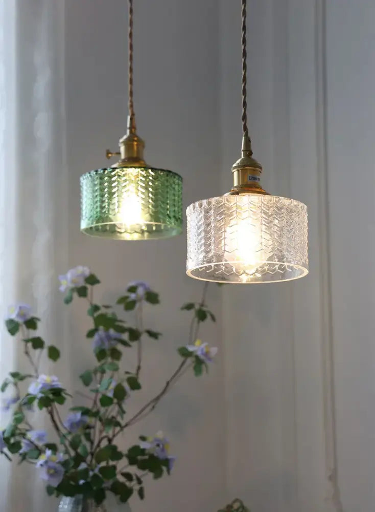 Two vintage glass shade chandelier pendant lights with emerald green and clear textured glass for dining room use