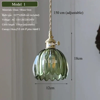 Vintage green glass pendant light with ribbed ruffled petal design brass fixture and adjustable cord for dining room