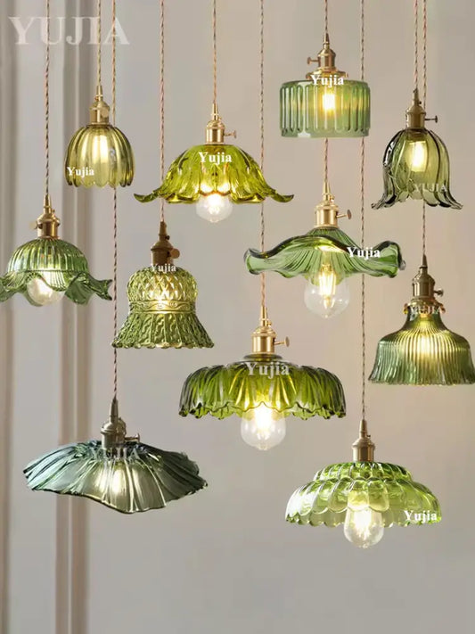 Vintage pendant light with green glass ruffled petal design and brass fixtures for dining room lighting