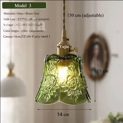 Vintage green glass pendant light with floral embossing and brass iron hardware for dining room use