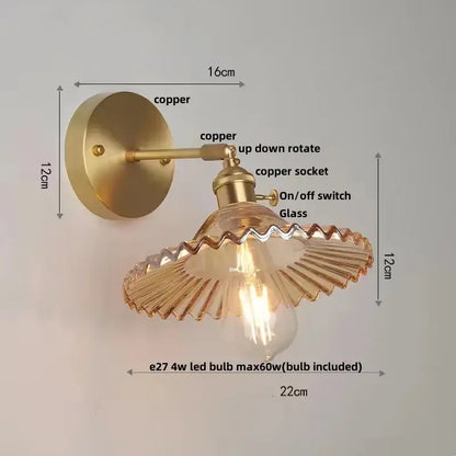 Gold-toned copper wall light with scalloped glass shade and pull chain switch vintage green glass bedroom sconce
