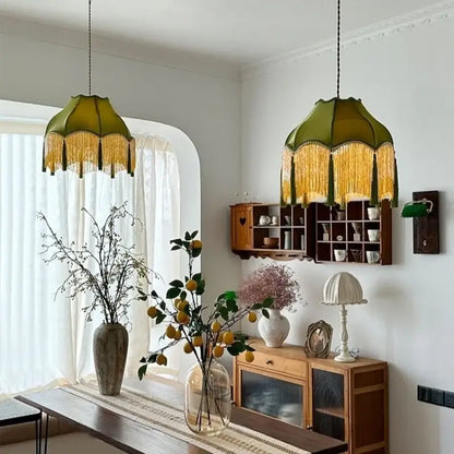 Two olive-green fringed velvet pendant lights with golden tassels for living room decorbites green tassel pendant light