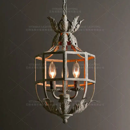 Vintage grey metal cage lantern chandelier with ornate leaf motifs and three glowing candle bulbs for dining room decorbites grey metal