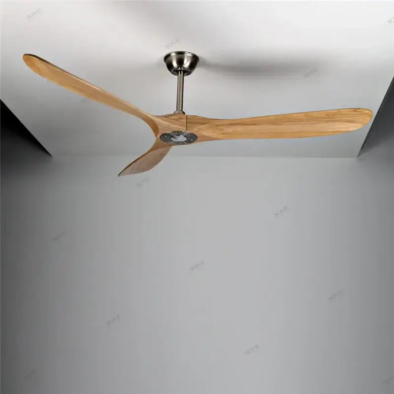 Modern vintage ceiling fan with three light brown wooden blades and brushed metallic hub for living room use
