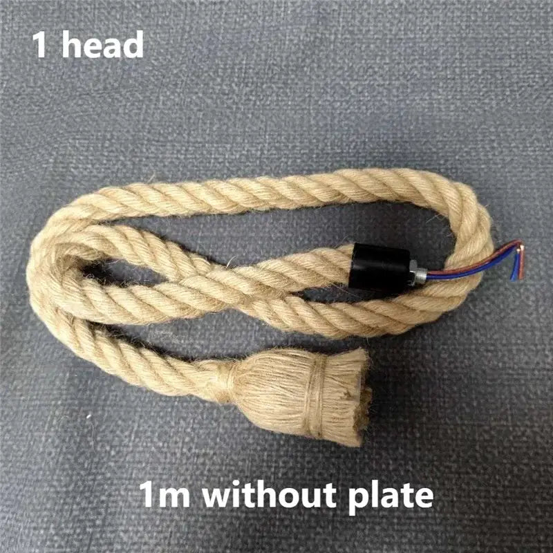 Vintage hemp rope pendant light with natural fiber cord pendant and black connector for focused dining room lighting