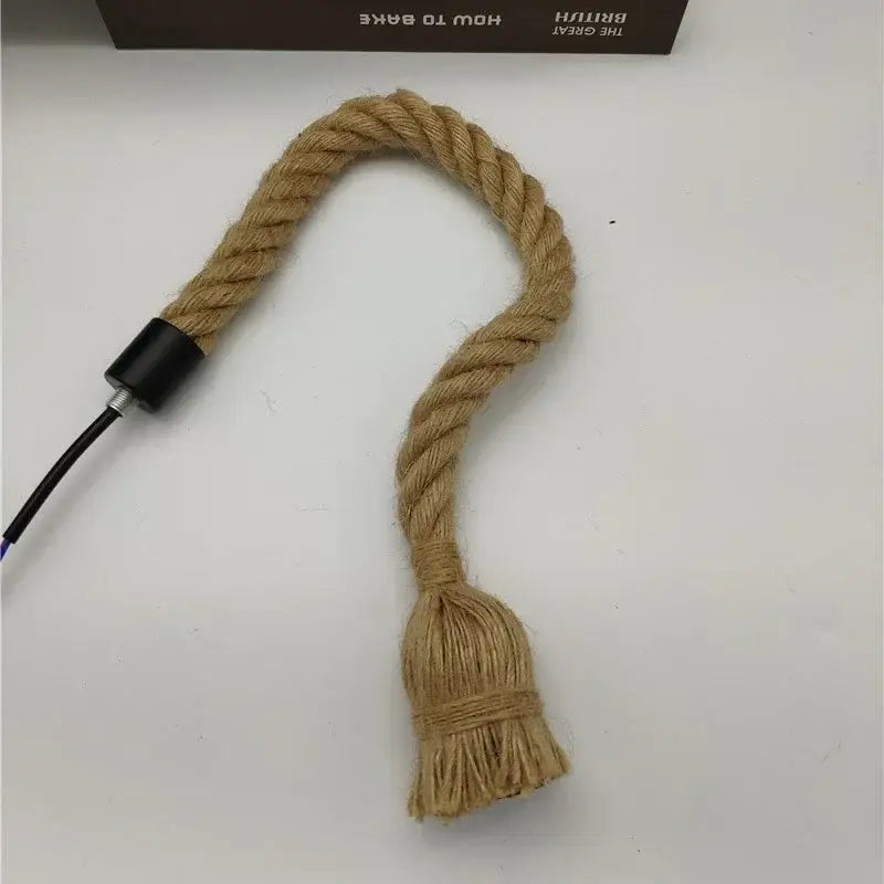 Natural fiber vintage hemp rope pendant light cord with black connector and frayed tassel for focused lighting