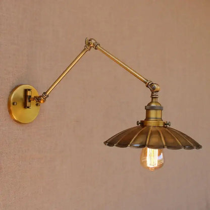 Vintage industrial brass wall lamp with adjustable swing arm, fluted shade, and exposed filament bulb for bedroom reading decorbites adjustable swing