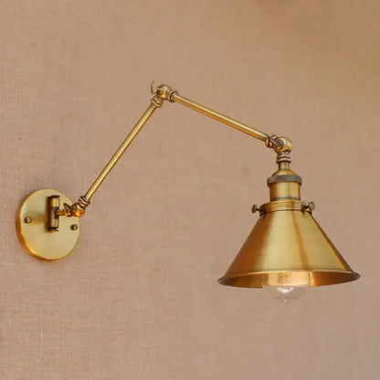 Brass industrial-style wall lamp with adjustable swing arm and conical shade for vintage bedroom reading decorbites adjustable swing
