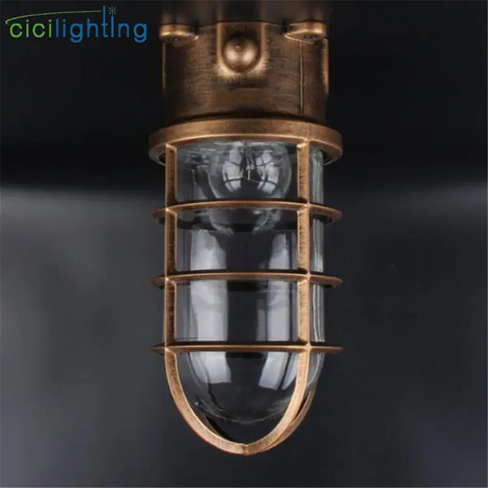 Antique brass industrial-style pendant light with clear glass jar ceiling enclosure and protective cage for decorbites clear glass decor