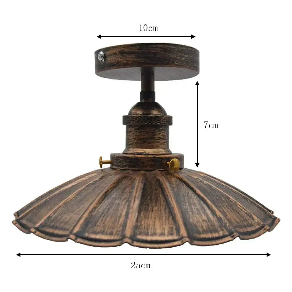 Vintage industrial flush mount light with antique bronze finish, fluted scalloped shade, and wooden base for kitchen decorbites industrial flush