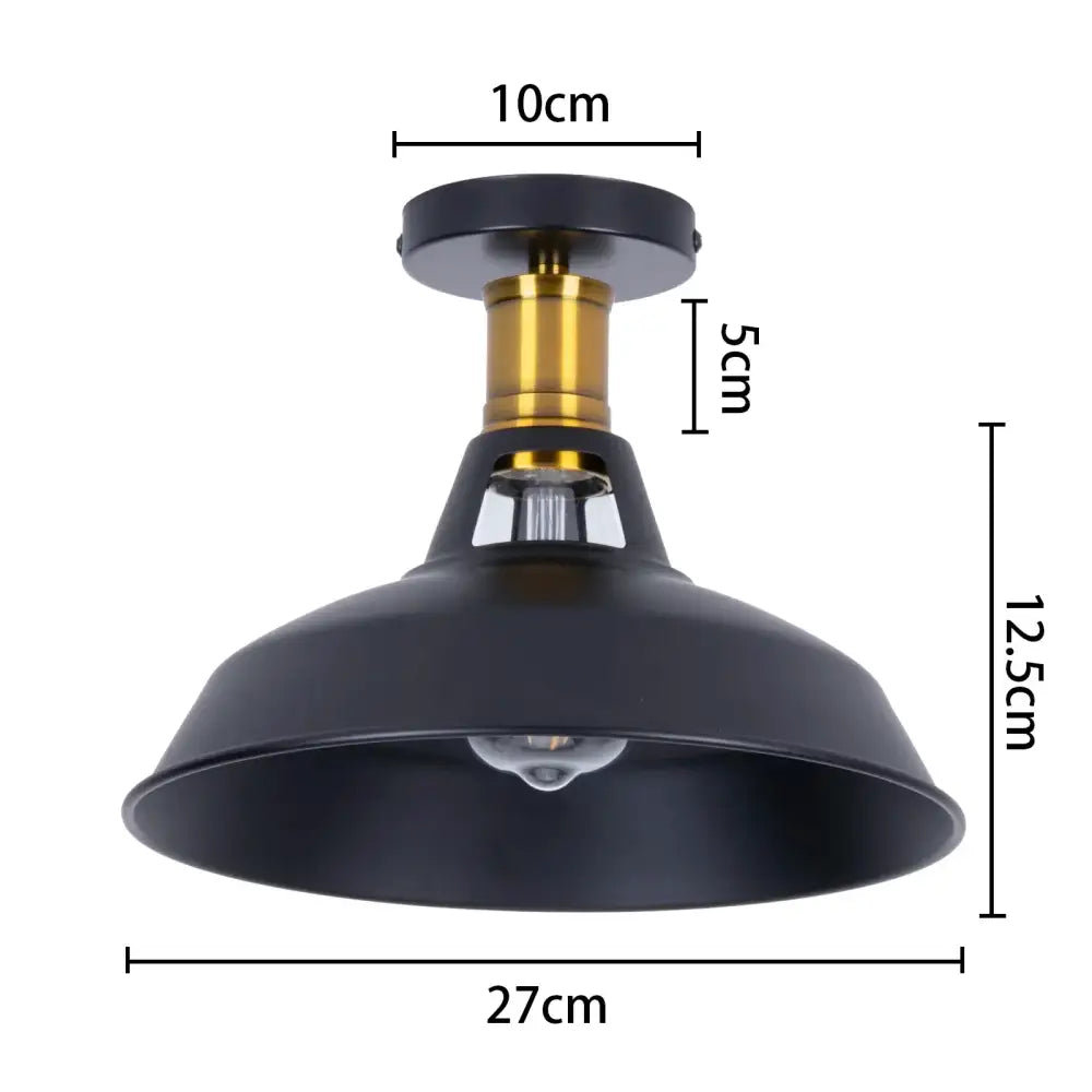 Black metal industrial flush mount light with brass stem and exposed bulb for vintage kitchen decorbites industrial flush