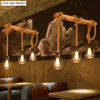 Decorbites vintage style island lighting fixture with rustic wooden beam black metal cages and braided rope suspension