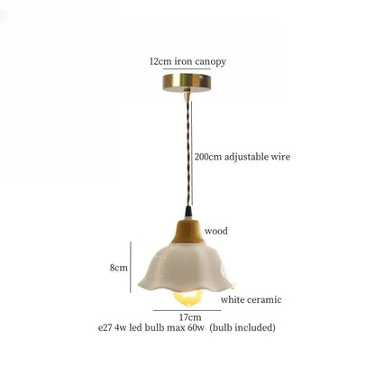 A delicate white ceramic pendant light with wooden collar and brass canopy from decorbites beige cloth led collection