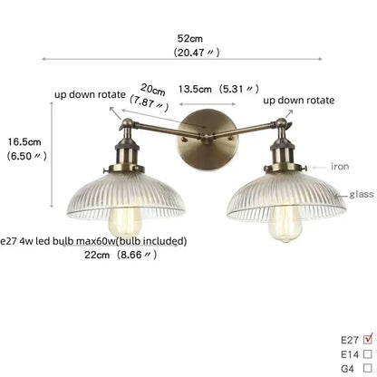 Vintage loft brass wall lamp with double-arm design, ribbed glass shades, and exposed Edison bulbs for decorbites industrial vintage style