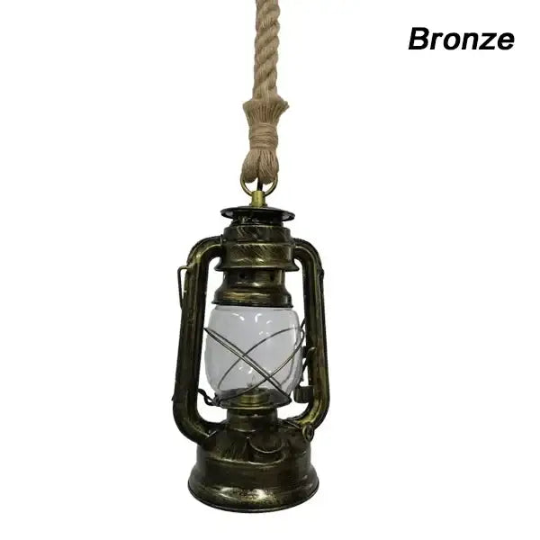 Bronze-colored vintage mixed metal cage pendant light with clear glass globe and twisted rope for decorative presence
