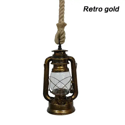 Retro gold pendant light with glass globe and metal construction suspended by thick rope for decorative presence