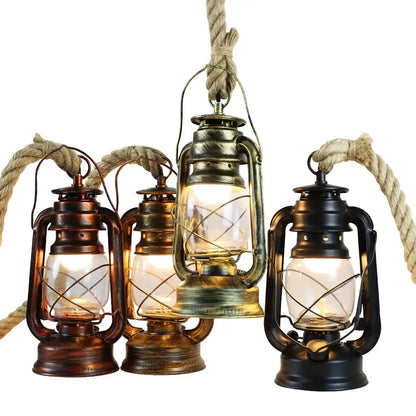 Three vintage mixed metal cage pendant lights with copper, brass, and black finishes for dining room decorative presence