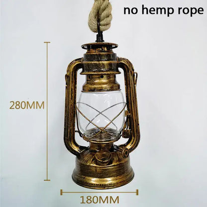 Vintage mixed metal pendant light with brass construction, clear glass globe, and decorative presence for dining room