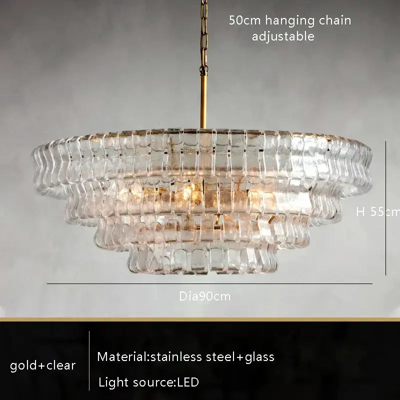A tiered brown glass chandelier with gold stainless steel frame and adjustable chain for dining room decorbites brown glass