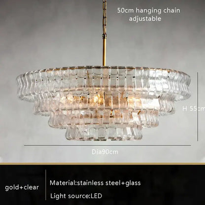 A tiered brown glass chandelier with gold stainless steel frame and adjustable chain for dining room decorbites brown glass