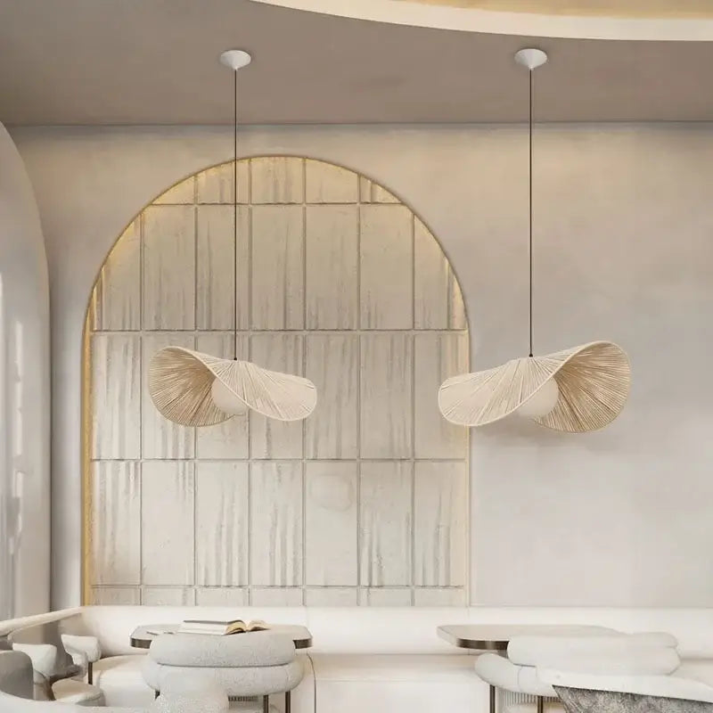 Two elegant off-white pendant lights with a woven leaf design made of decorbites cotton rope for bedroom decor