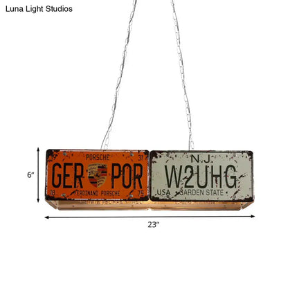 Rustic industrial island ceiling light with vintage orange and white license plates for dining room ceiling light