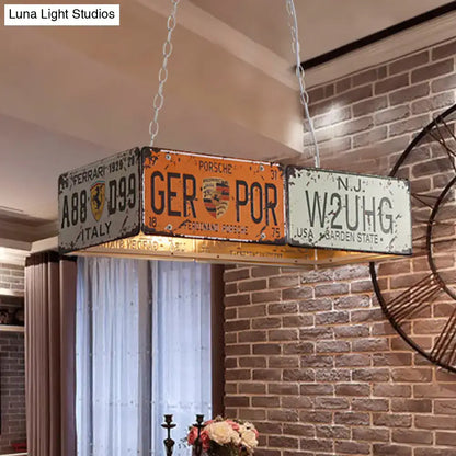 Rustic industrial orange and white rectangle island ceiling light featuring vintage ferrari porsche and new jersey license plates