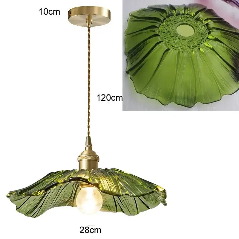A 10cm brass ceiling mount pendant light with a twisted cord and translucent olive-green petal glass with led bulb included