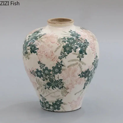 A cream-colored porcelain vase with pink floral patterns and decorbites cracked texture for vintage living room decor