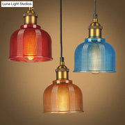 DecorBites vintage carillon pendant light with red blue and amber textured glass shades and brass fixtures for dining room