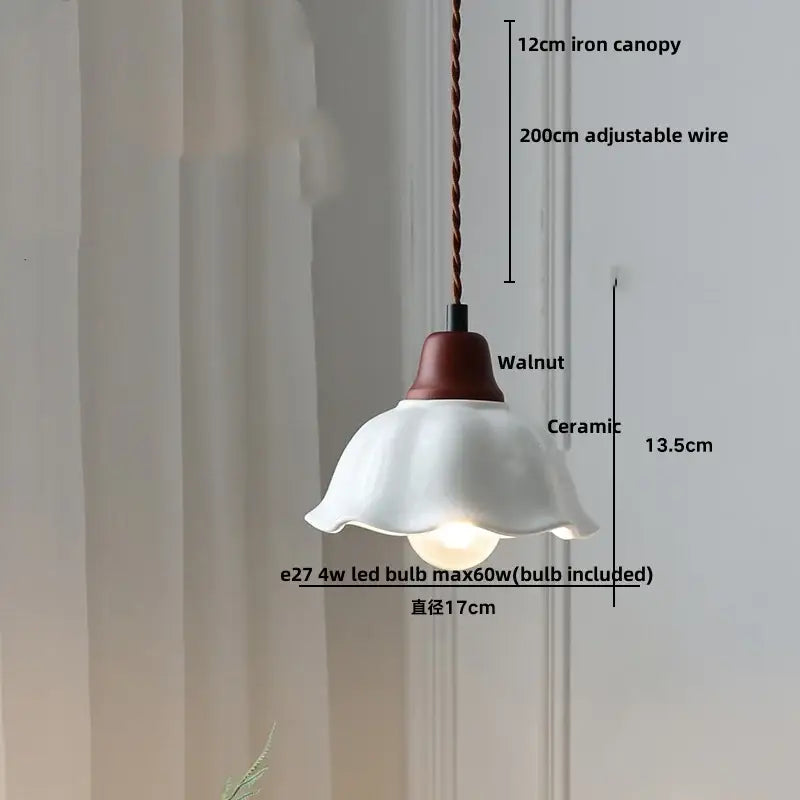 A delicate white ceramic wood led pendant light with a fluted shade and dark walnut top for dining room decorbites ceramic wood